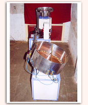 AUTOMATIC MACHINE FOR LONG CAPS WADING SLITTING